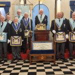 Members of Oakeswell Lodge No. 8117, a Freemasons lodge in the West Midlands, pictured together in the lodge room in ceremonial dress