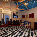 Interior of the Masonic lodge room at Oakeswell Lodge No. 8117 in the West Midlands, showing the traditional tiled floor, officers’ chairs and ceremonial layout
